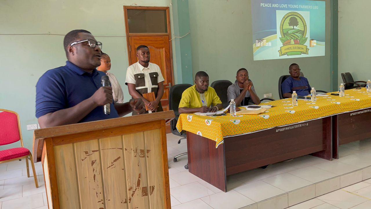 Speaker addressing participants during the launch